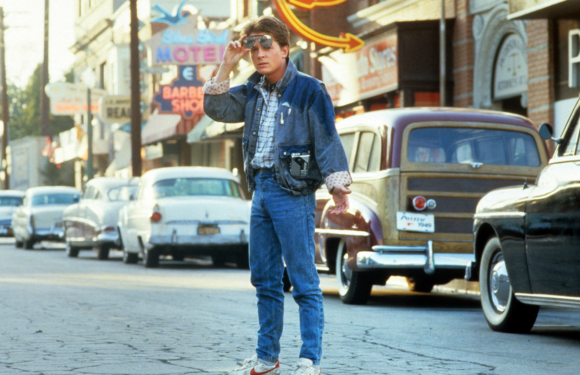 Michael J Fox walking across the street in a scene from the film 'Back To The Future', 1985. (Photo by Universal/Getty Images)